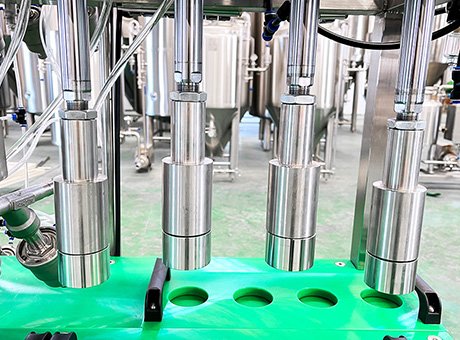 Semi-automatic bottle filler with crown capping